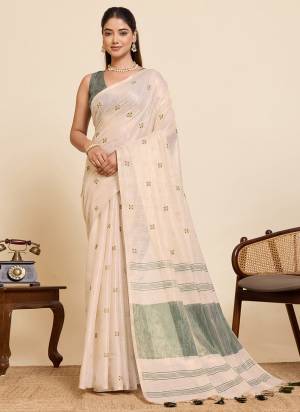 Garb This Party Wear Saree Paired With Blouse.This Saree And Blouse Are Linen Silk Fabric With Woven Pallu With Embroidery Work Designer. Buy This Pretty Saree Now.