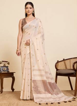Garb This Party Wear Saree Paired With Blouse.This Saree And Blouse Are Linen Silk Fabric With Woven Pallu With Embroidery Work Designer. Buy This Pretty Saree Now.