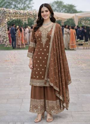  Looking These Party Wear Plazzo Suit in Fine Colored Pair With Dupatta.These Top,Bottom And Dupatta Are Georgette Fabricated.Its Beautified With Designer Heavy Embroidery,Zarkan Work.