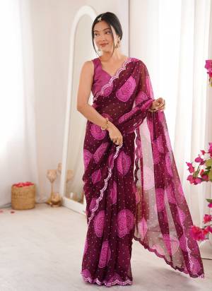 Looking These Party Wear Saree in Fine Colored.These Saree Are Georgette And Blouse is Mono Banglori Fabricated.Its Beautified With Designer Bandhani Gola Printed With Mirror Cut Work Border.
