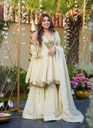 Garb These Suit in Fine Colored Pair With Bottom And Dupatta.These Top Are Chinon And Bottom Are Fabricated On Chinon Pair With Chinon Dupatta.Its Beautified With Designer Mirror Embroidery Work.