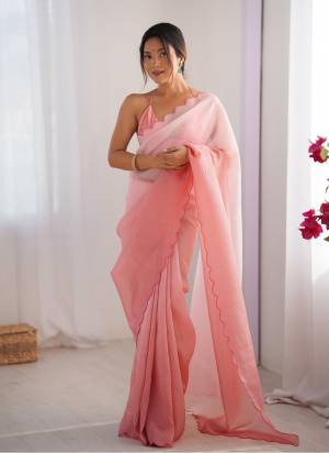 Attractive These Fancy Party Wear Saree in Fine Pedding Colored.These Saree Are Crunchy And Blouse is Ultra Satin Fabricated.Its Beautified With Pedding Color,Arco Border Lace Work.