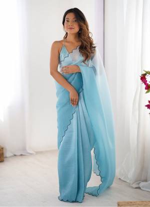 Attractive These Fancy Party Wear Saree in Fine Pedding Colored.These Saree Are Crunchy And Blouse is Ultra Satin Fabricated.Its Beautified With Pedding Color,Arco Border Lace Work.