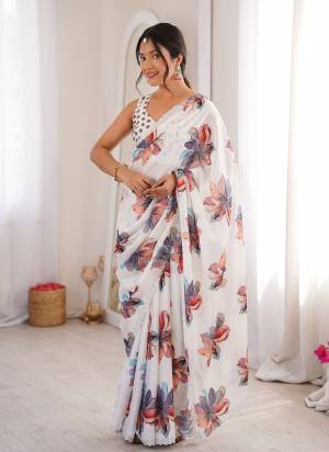 Garb These Party Wear Saree in Fine Colored.These Saree Are Chinon And Blouse is Chinon Fabricated.Its Beautified With Designer Digital Printed With Swarovski Cut Work Border.