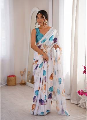 Garb These Party Wear Saree in Fine Colored.These Saree Are Chinon And Blouse is Chinon Fabricated.Its Beautified With Designer Digital Printed With Swarovski Cut Work Border.