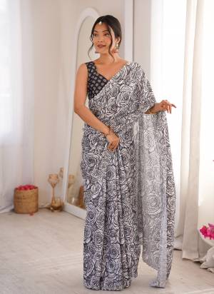 Garb These Party Wear Saree in Fine Colored.These Saree Are Chinon And Blouse is Chinon Fabricated.Its Beautified With Designer Digital Printed With Swarovski Cut Work Border.