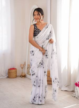 Garb These Party Wear Saree in Fine Colored.These Saree Are Chinon And Blouse is Chinon Fabricated.Its Beautified With Designer Digital Printed With Swarovski Cut Work Border.