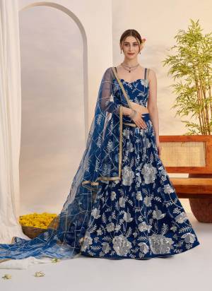 For A Different Look,Grab These Party Wear Designer Lehenga in All Over Pretty Colored Pair With Blouse And Dupatta.These Lehenga Choli And Dupatta is All Over Butterfly Net Base Fabric With Designer Cotton Thread, Sequance Embroidery Work.