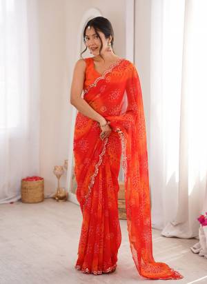 Garb These Party Wear Saree in Fine Colored.These Saree Are Georgette And Blouse is Mono Banglori Fabricated.Its Beautified With Designer Bandhani Printed With Mirror Cut Work Border.