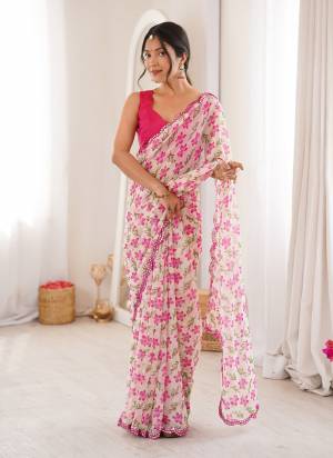 Garb These Party Wear Saree in Fine Colored.These Saree Are Georgette And Blouse is Mono Banglori Fabricated.Its Beautified With Designer Floral Printed With Mirror Cut Work Border.