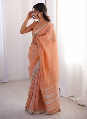 Garb These Party Wear Saree in Fine Colored.These Saree Are Spun Cotton And Blouse is Spun Cotton Fabricated.Its Beautified With Woven Jari Designer,Jari,Dori,Mirror Embroidery Work Lace Border.