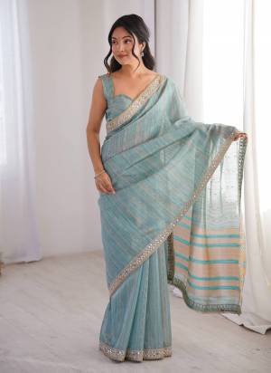 Garb These Party Wear Saree in Fine Colored.These Saree Are Spun Cotton And Blouse is Spun Cotton Fabricated.Its Beautified With Woven Jari Designer,Jari,Dori,Mirror Embroidery Work Lace Border.