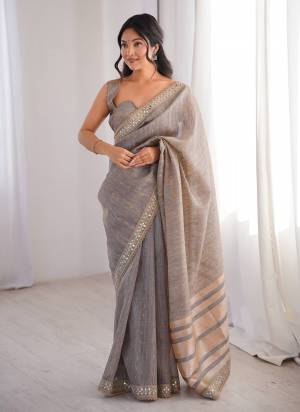 Garb These Party Wear Saree in Fine Colored.These Saree Are Spun Cotton And Blouse is Spun Cotton Fabricated.Its Beautified With Woven Jari Designer,Jari,Dori,Mirror Embroidery Work Lace Border.