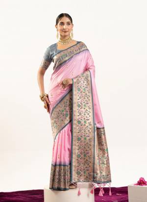 Garb These Festive And Party Wear Saree in Fine Colored.These Saree And Blouse is Fabricated On Banarasi Silk.Its Beautified With Traditional Paithani Meenakari Woven Designer.
