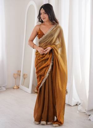 Attractive These Fancy Party Wear Saree in Fine Double Shaded Colored.These Saree Are Fendy Satin And Blouse is Fendy Satin Fabricated.Its Beautified With Double Shaded Color With Sequance,Jari Lace Work.
