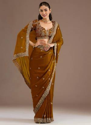 Attrective This Partywear Saree Paired With Blouse.This Saree Are Tissue And Blouse Are Tissue Based Fabric With Designer Sequance,Dori,Jari Embroidery With Diamond,Pearl Work. Buy This Pretty Saree Now.
