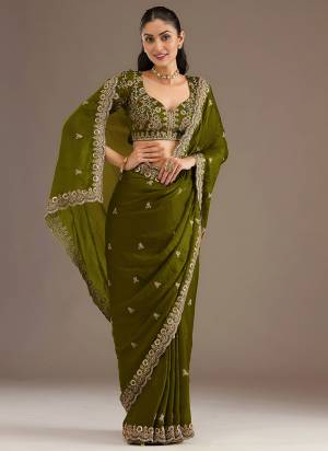 Attrective This Partywear Saree Paired With Blouse.This Saree Are Tissue And Blouse Are Tissue Based Fabric With Designer Sequance,Dori,Jari Embroidery With Diamond,Pearl Work. Buy This Pretty Saree Now.