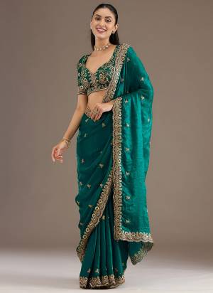 Attrective This Partywear Saree Paired With Blouse.This Saree Are Tissue And Blouse Are Tissue Based Fabric With Designer Sequance,Dori,Jari Embroidery With Diamond,Pearl Work. Buy This Pretty Saree Now.