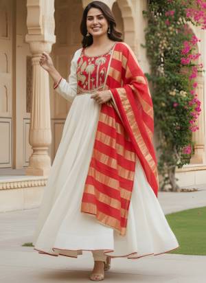 Garb These Suit in Fine Colored Pair With Bottom And Dupatta.These Top Are Silk And Bottom Are Fabricated On Silk Pair With Jacquard Silk Dupatta.Its Beautified With Designer Embroidery Work.