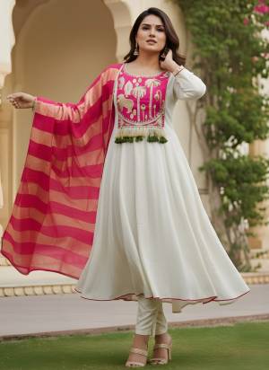 Garb These Suit in Fine Colored Pair With Bottom And Dupatta.These Top Are Silk And Bottom Are Fabricated On Silk Pair With Jacquard Silk Dupatta.Its Beautified With Designer Embroidery Work.