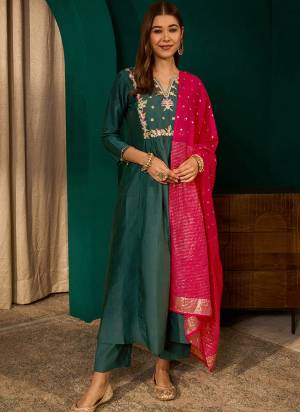 Garb These Suit in Fine Colored Pair With Bottom And Dupatta.These Top Are Silk Slub And Bottom Are Fabricated On Silk Slub Pair With Viscose Jacquard Dupatta.Its Beautified With Designer Embroidery Work.