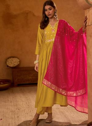 Garb These Suit in Fine Colored Pair With Bottom And Dupatta.These Top Are Silk Slub And Bottom Are Fabricated On Silk Slub Pair With Viscose Jacquard Dupatta.Its Beautified With Designer Embroidery Work.