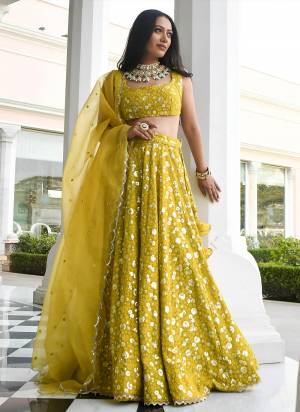 For A Designer Look,Grab These Lehenga Choli in Fine Colored.These Lehenga And Blouse Are Fabricated On Georgette Pair With Dupatta Are Organza.Its Beautified With Designer Embroidery Work.