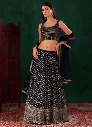 For A Designer Look,Grab These Lehenga Choli in Fine Colored.These Lehenga And Blouse Are Fabricated On Georgette Pair With Dupatta Are Soft Net.Its Beautified With Designer Embroidery Work.