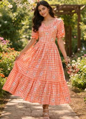 Garb These Beautiful Looking Readymade Long Kurti.These Kurti Are Muslin Fabricated.Its Beautified With Designer Gingham Printed.