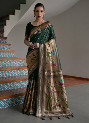 Garb These Festive And Party Wear Saree in Fine Colored.These Saree And Blouse is Fabricated On Banarasi Silk.Its Beautified With Traditional Paithani Meenakari Woven Designer.