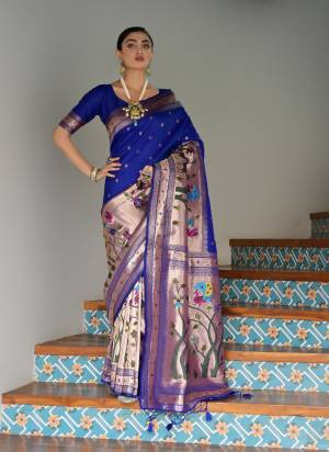 Garb These Festive And Party Wear Saree in Fine Colored.These Saree And Blouse is Fabricated On Banarasi Silk.Its Beautified With Traditional Paithani Meenakari Woven Designer.
