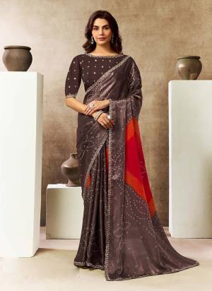 Look Attrective These Designer Party Wear Saree in Fine Colored.These Saree Are Two Tone Satin Silk And Blouse Are Natural Silk is Fabricated.Its Beautified Desiger Printe,Embroidery,Pearl,Stone Work.