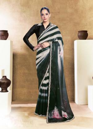 Look Attrective These Designer Party Wear Saree in Fine Colored.These Saree Are Two Tone Satin Silk And Blouse Are Satin Silk is Fabricated.Its Beautified Desiger Printe,Embroidery,Pearl,Stone Work.