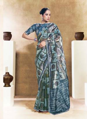 Look Attrective These Designer Party Wear Saree in Fine Colored.These Saree Are Two Tone Paper Silk And Blouse Are Two Tone Paper Silk is Fabricated.Its Beautified Desiger Printe,Embroidery,Pearl,Stone Work.