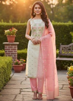 Garb These Disigner Suit in Fine Colored Pair With Bottom And Dupatta.These Top Are Simmer Jacquard And Dupatta Are Fabricated On Simmer Jacquard Pair With Santoon Bottom.Its Beautified With Woven Designer Embroidery Work.