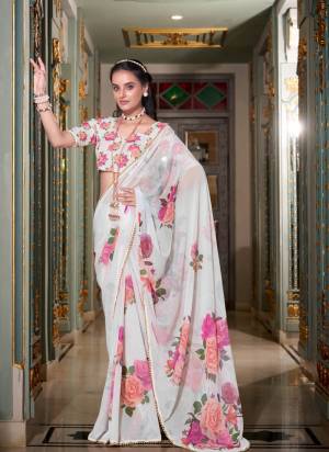 Garb These Festive And Party Wear Saree in Fine Colored.These Saree And Blouse is Fabricated On Georgette.Its Beautified With Designer Digital Printed With Pearl Lace Border.