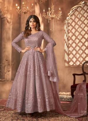 Garb These Party Wear Designer Anarkali Suit in Fine Colored Pair With Bottom And Dupatta.These Top Are Net And Dupatta Are Fabricated On Net Pair With Santoon Bottom.Its Beautified With Satin Inner.Its Beautified With Heavy Designer Sequance Embroidery Work.