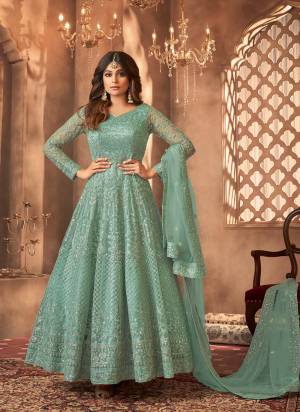 Garb These Party Wear Designer Anarkali Suit in Fine Colored Pair With Bottom And Dupatta.These Top Are Net And Dupatta Are Fabricated On Net Pair With Santoon Bottom.Its Beautified With Satin Inner.Its Beautified With Heavy Designer Sequance Embroidery Work.
