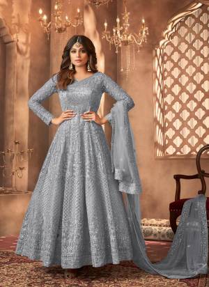 Garb These Party Wear Designer Anarkali Suit in Fine Colored Pair With Bottom And Dupatta.These Top Are Net And Dupatta Are Fabricated On Net Pair With Santoon Bottom.Its Beautified With Satin Inner.Its Beautified With Heavy Designer Sequance Embroidery Work.