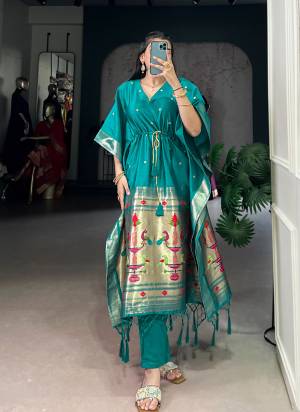Attractive These Beautiful Looking Readymade Long Kaftaan.These Kaftaan Fabricated On Soft Silk.Its Beautified With Woven Jacquard Paithani Designer.