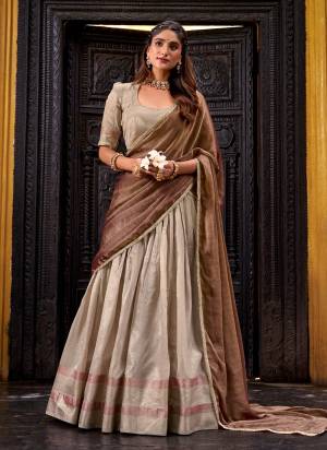 Looking These Party Wear Lehenga Choli in Fine Colored. These Lehenga And Blouse Are Dupion Silk And Dupatta Are Fabricated On Simmer Jari Fabriced. It is Beautified With Woven Jari Patta Designer.