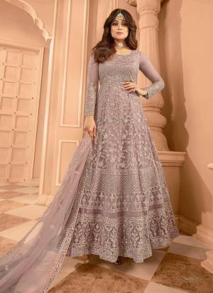 Garb These Party Wear Designer Anarkali Suit in Fine Colored Pair With Bottom And Dupatta.These Top Are Net And Dupatta Are Fabricated On Net Pair With Santoon Bottom.Its Beautified With Satin Inner.Its Beautified With Heavy Designer Sequance Embroidery Work.