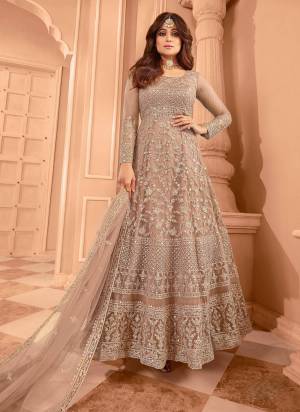 Garb These Party Wear Designer Anarkali Suit in Fine Colored Pair With Bottom And Dupatta.These Top Are Net And Dupatta Are Fabricated On Net Pair With Santoon Bottom.Its Beautified With Satin Inner.Its Beautified With Heavy Designer Sequance Embroidery Work.