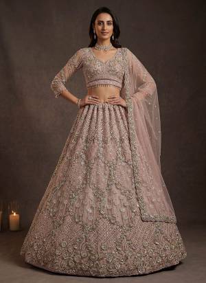 For A Fancy Designer Look,Grab These Lehenga Choli With Dupatta in Fine Colored.These Lehenga And Choli Are Net And Dupatta Are Fabricated On Soft Net Pair.Its Beautified With Fancy Jari,Sequance,Multy Thread,Dori Embroidery Work. 