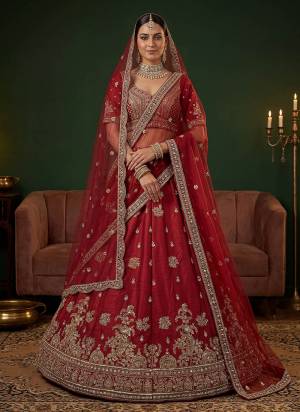 For A Fancy Designer Look,Grab These Lehenga Choli With 2 Dupatta in Fine Colored.These Lehenga And Choli Are Gadhwal Silk And Dupatta Are Fabricated On Net Pair.Its Beautified With Fancy Jari,Sequance,Dori Embroidery,Beads Work. 
