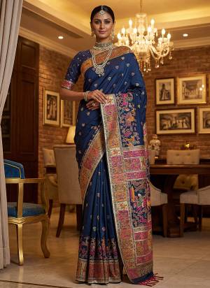 Garb These Fastive And Party Wear Saree in Fine Colored.These Saree Are Virana Silk And Blouse is Fabricated On Pashmina Silk.Its Beautified With Heavy Woven Designer Jari And Swarovski Work.