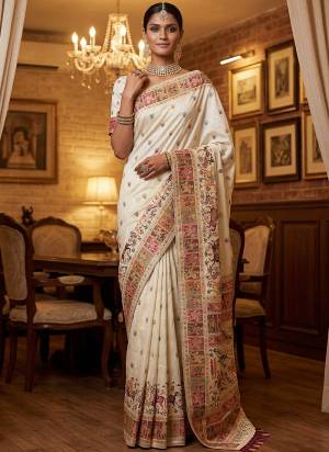 Garb These Fastive And Party Wear Saree in Fine Colored.These Saree Are Virana Silk And Blouse is Fabricated On Pashmina Silk.Its Beautified With Heavy Woven Designer Jari And Swarovski Work.