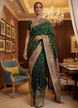 Garb These Fastive And Party Wear Saree in Fine Colored.These Saree Are Virana Silk And Blouse is Fabricated On Pashmina Silk.Its Beautified With Heavy Woven Designer Jari And Swarovski Work.