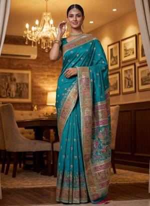 Garb These Fastive And Party Wear Saree in Fine Colored.These Saree Are Virana Silk And Blouse is Fabricated On Pashmina Silk.Its Beautified With Heavy Woven Designer Jari And Swarovski Work.