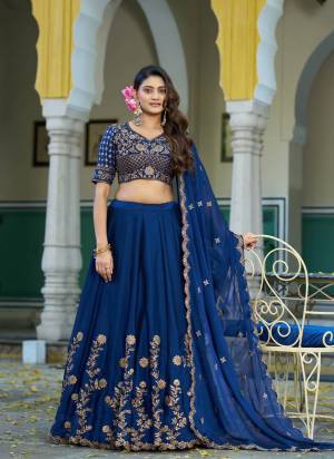 Looking These Party Wear Lehenga Choli in Fine Colored. These Lehenga And Blouse Are Rangoli Silk And Dupatta Are Fabricated On Rangoli Silk Fabriced. It is Beautified With Designer Sequance,Thread Embroidery Work.
